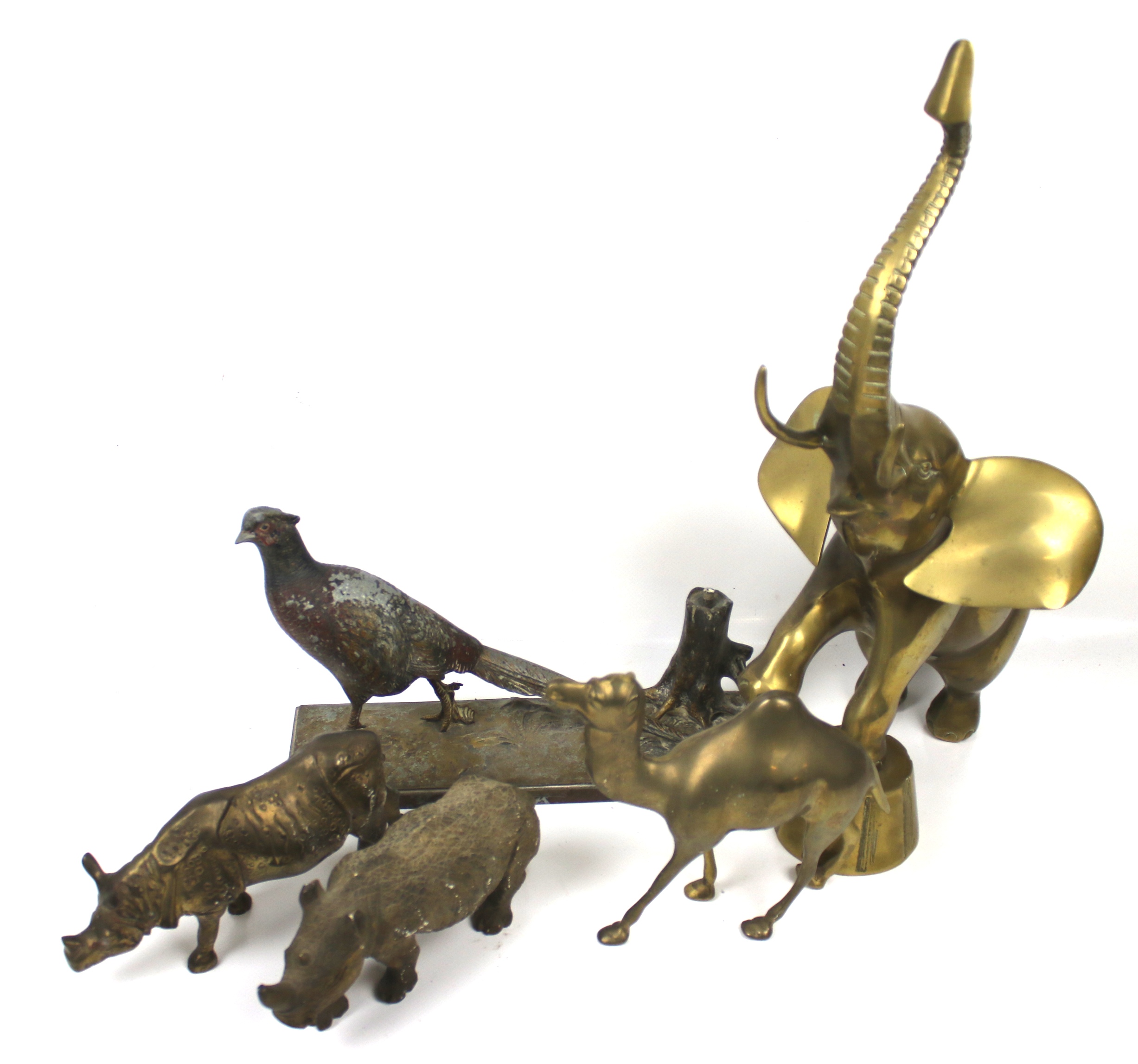 An assortment of metal animals figures. Including a brass elephant, two rhinos, etc. Max.