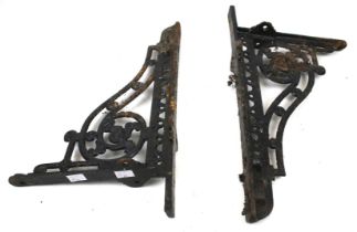 A pair of Victorian cast iron brackets.