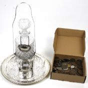 An assortment of silver plate, glassware and coins.