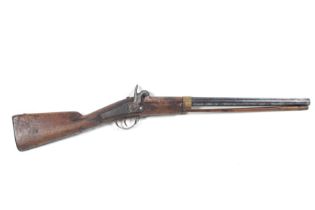 A foreign muzzle loading shotgun. Circa 1860, 19.5" barrels, 10 gauge.