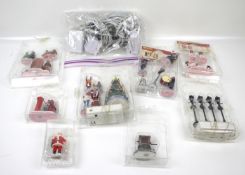 An assortment of Lemax accessories sets and adaptors.