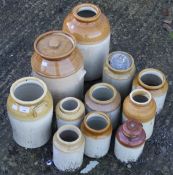 A collection of salt glazed stoneware jars. Max.