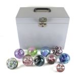 Ten boxed Caithness glass paperweights. Including 'Myriad', 'Wavecrest', etc.