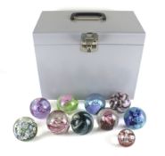 Ten boxed Caithness glass paperweights. Including 'Myriad', 'Wavecrest', etc.