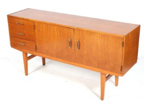 A mid-century C W S Ltd sideboard. Three drawers beside a two door cupboard.