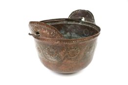 A late 19th century copper pot cauldron.
