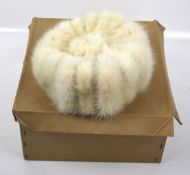 A ladies vintage mink fur hat.