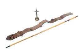 A Trench Art cross, an early 20th century sword stick and a leather belt.