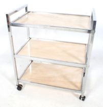 A contemporary Art Deco style chrome tea trolley.