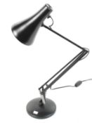 A contemporary Anglepoise Lighting Ltd desk lamp 90. In black with circular base.