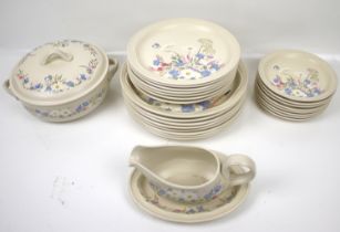 A Poole pottery dinner service.