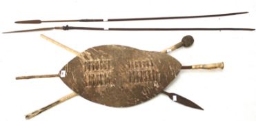 A vintage African tribal shield and 19th century spears.