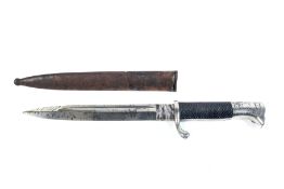 A WWII German dress bayonet. Marked Eckhorn Solingen to blade. In a metal scabbard. L34.