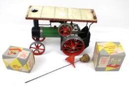 A Mamod steam tractor and Tri-ang toy crane.