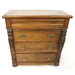 A 20th century mahogany chest of drawers.