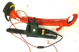 An electric Bosch chainsaw and a Flymo electric strimmer.