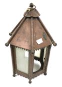 A vintage copper hall lantern with frosted glass panels. Of hexagonal form.