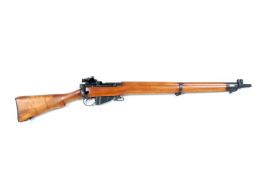 An Enfield .303 model No.4 bolt action rifle. Serial No 7922357.