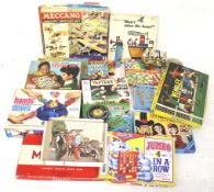 An assortment of vintage games. Including Meccano 'Airport Service Set', 'Tell Me' Quiz Game, etc.