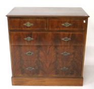 A contemporary mahogany chest of drawers.