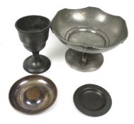 Four pewter items. Comprising an Art Deco pewter bowl, a goblet, small dish and an ashtray. Max.