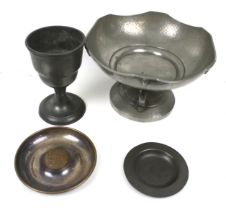 Four pewter items. Comprising an Art Deco pewter bowl, a goblet, small dish and an ashtray. Max.