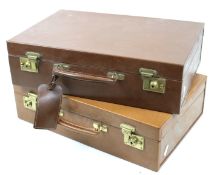 Two vintage suitcases. Brown in colour with leather handles, L46.