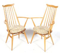 A pair of mid-century Ercol 'goldsmith' open armchairs.