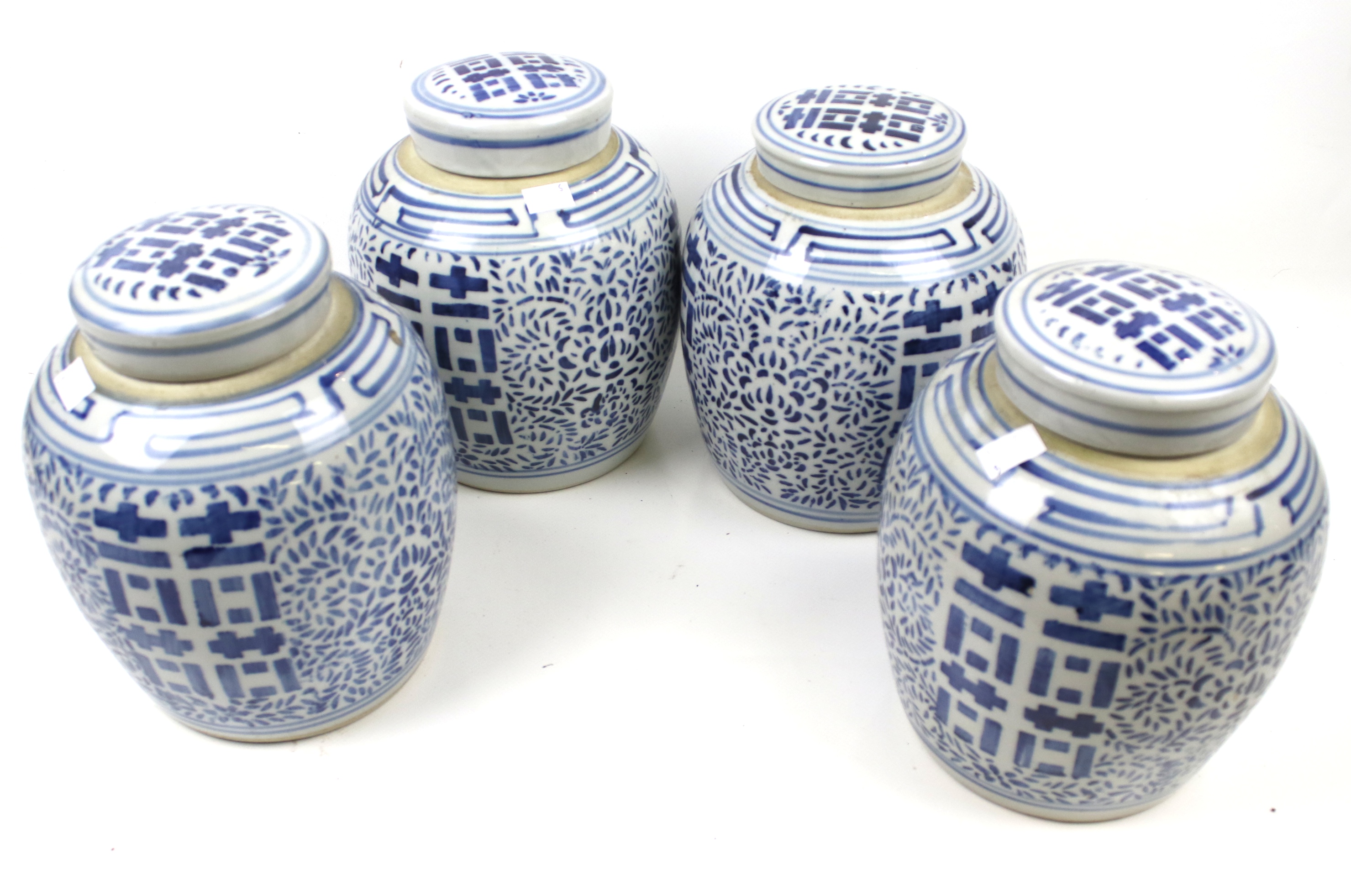 Four contemporary Chinese ceramic ginger jars and covers.