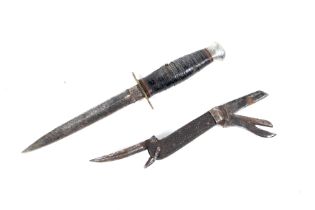 A double sided military fighting dagger and a military pen knife. Dagger L24.