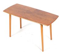 A Staples & Co Ltd mid-century plywood coffee table. On turned tapering supports.