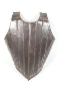 An iron breastplate in the style of Italian late 16th century.