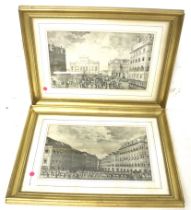 A pair of 19th century European cityscape architectural engravings. Framed and glazed.