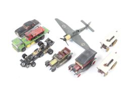 A collection of miscellaneous play worn die cast toys to include a Dinky Stuka dive bomber.