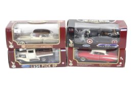 Four boxed 'Road Legends' diecast cars.