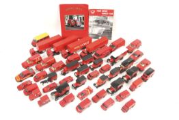 A collection of assorted die cast model Post Office vehicles.
