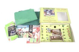 A collection of Subbuteo table football accessories. Including playing field and teams etc.