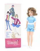 An Ideal circa 1960 Tammy doll. Wearing a blue outfit, in original box.