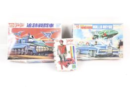 A collection of three Imai Thunderbirds model kits.