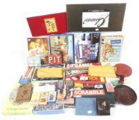 A collection of assorted vintage board games.