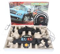 A Microscalextric Rally Dirt Racers set. Complete with cars, controllers and track, in original box.