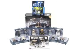 A collection of Dr Who diecast daleks. Noting the Parliament set in box and one Corgi example.