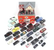 A collection of mixed diecast cars.