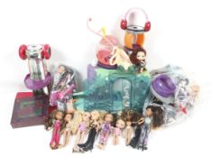 A collection of Bratz dolls and accessories.
