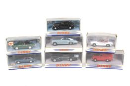 A collection of seven Dinky diecast cars.