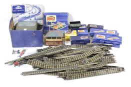 A OO Gauge collection of Hornby track, power unit and accessories.