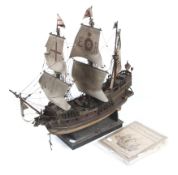 A wooden model of the ship 'The Golden Hind'.