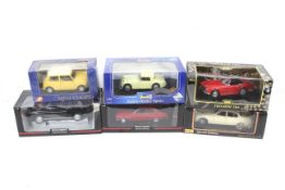 A collection of six 1:18 scale diecast cars. Featuring Minichamps and Maisto etc, all boxed.