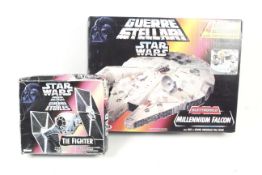 Two 1990s Star Wars ships. Comprising one Millenium Falcon and one Tie Fighter, both boxed.