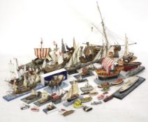 A collection of wooden model ships.
